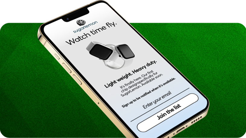 Smartphone mit einer Sugarlemon-Werbung mit zwei Smartwatches, Produktinformationen sowie einem E-Mail-Anmeldefeld und „Join the list“-Button.