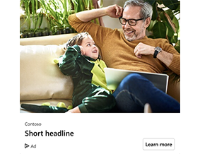 Child in dinosaur costume with laptop